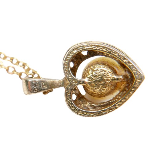 44 - A small group of jewellery, comprising a pair of 9ct gold hoop earrings, 1.8g, two silver gilt penda... 