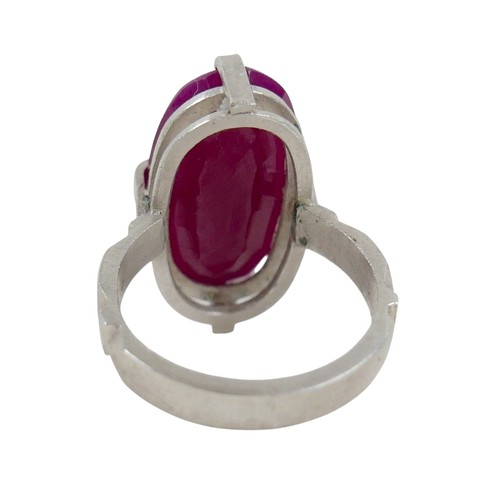 48 - A silver/white metal filled ruby single stone ring, head size 24 by 14 by 7mm, ring size Q.