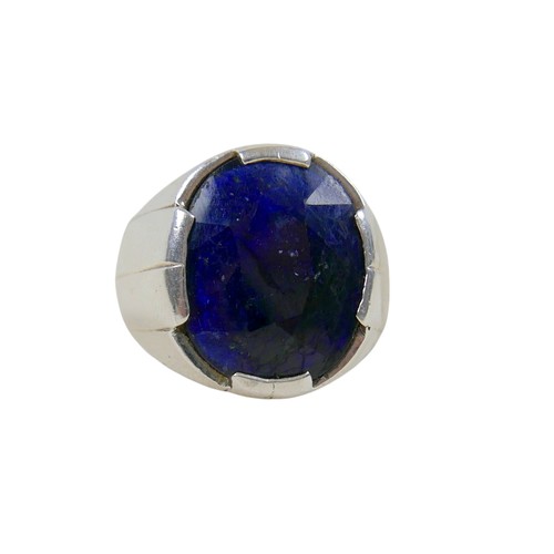 50 - A silver/white metal filled sapphire single stop ring head size 19 by 17mm, ring size R.
