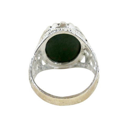 53 - A silver/white metal jade ring head size 17 by 20mm, ring size T.