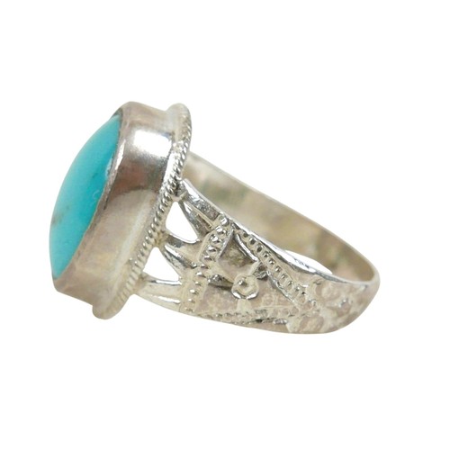 55 - A silver/white metal turquoise ring head size 18 by 13mm, ring size S.