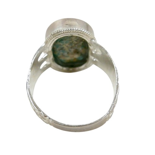55 - A silver/white metal turquoise ring head size 18 by 13mm, ring size S.