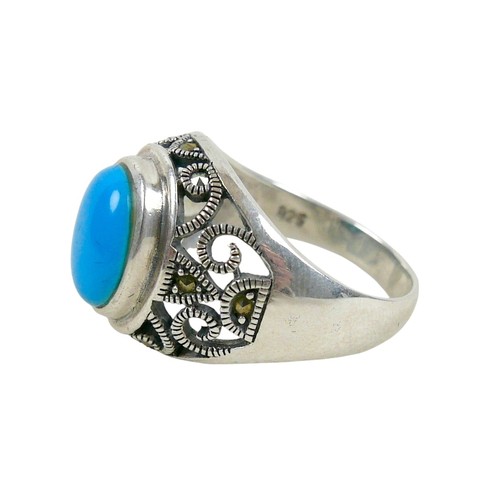 56 - A silver/white metal turquoise ring head size 13 by 16mm, ring size T.