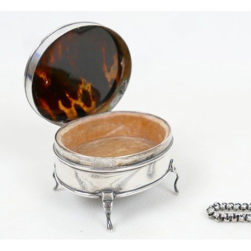 57 - A collection of siver/white metal jewellery and a trinket box comprising six chains, a bracelet, art... 