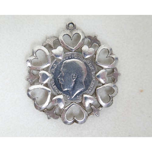57 - A collection of siver/white metal jewellery and a trinket box comprising six chains, a bracelet, art... 