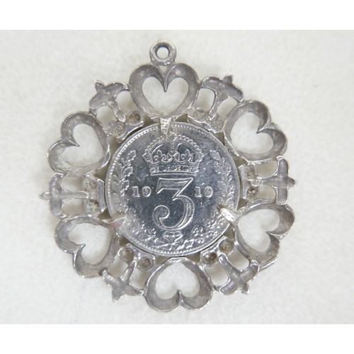 57 - A collection of siver/white metal jewellery and a trinket box comprising six chains, a bracelet, art... 