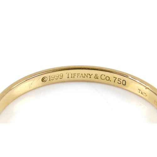 21 - Two 18ct yellow gold rings, comprising a Tiffany & Co band ring, 1.7mm band, size L, and a signet, s... 
