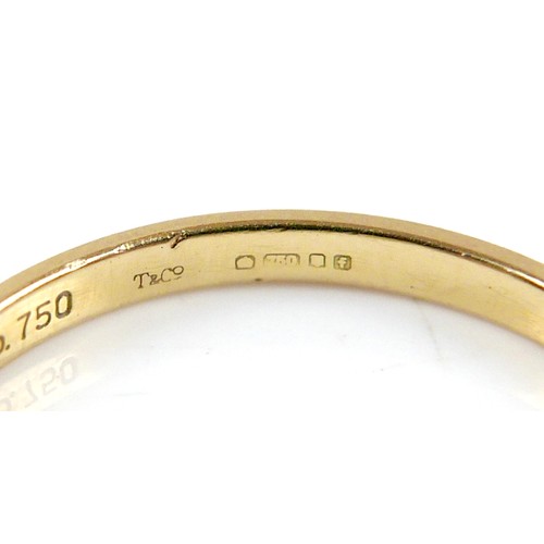 21 - Two 18ct yellow gold rings, comprising a Tiffany & Co band ring, 1.7mm band, size L, and a signet, s... 