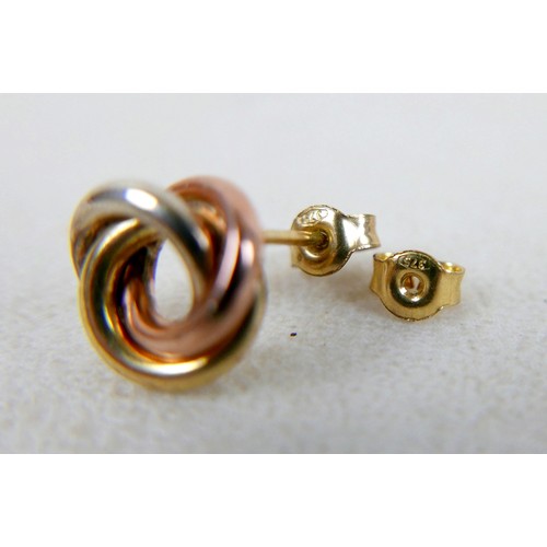 12 - A collection of 9ct yellow gold and gilt metal jewellery including brooches, earrings, a signet ring... 