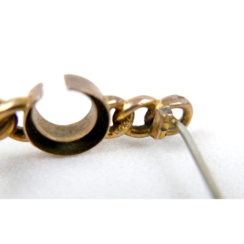12 - A collection of 9ct yellow gold and gilt metal jewellery including brooches, earrings, a signet ring... 