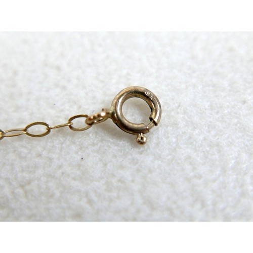 12 - A collection of 9ct yellow gold and gilt metal jewellery including brooches, earrings, a signet ring... 