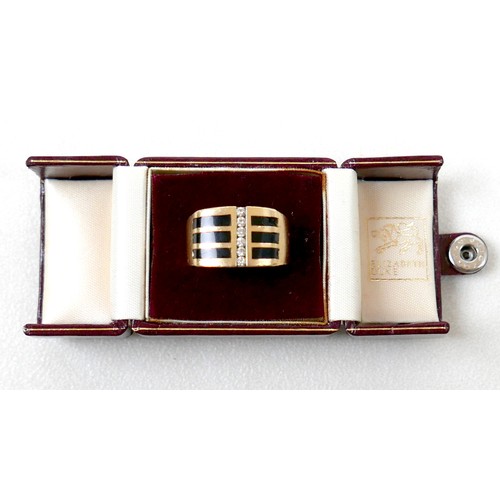 7 - An 18ct yellow gold diamond and black stone ring set with a central row of six small diamonds, ring ... 