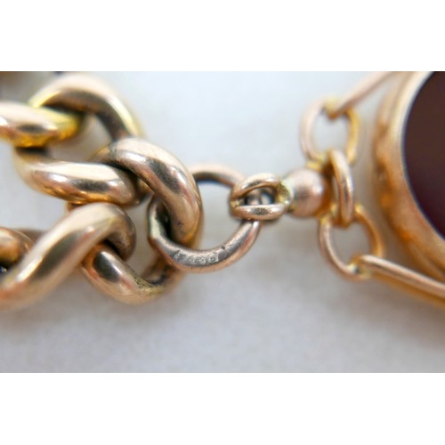 6 - A 9ct gold kerb link charm bracelet, with heart shaped padlock clasp and safety chain, fitted with f... 
