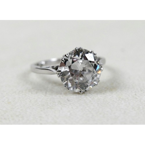 1 - An 18ct white gold and diamond solitaire ring, the round brilliant cut stone approximately 2.8ct, 9.... 