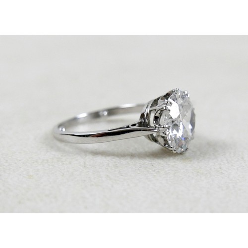 1 - An 18ct white gold and diamond solitaire ring, the round brilliant cut stone approximately 2.8ct, 9.... 