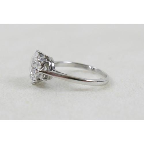 1 - An 18ct white gold and diamond solitaire ring, the round brilliant cut stone approximately 2.8ct, 9.... 