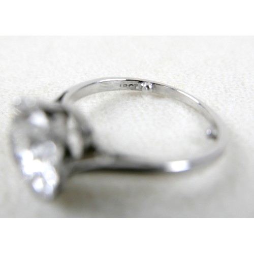 1 - An 18ct white gold and diamond solitaire ring, the round brilliant cut stone approximately 2.8ct, 9.... 