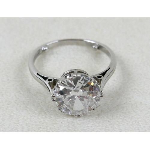 1 - An 18ct white gold and diamond solitaire ring, the round brilliant cut stone approximately 2.8ct, 9.... 