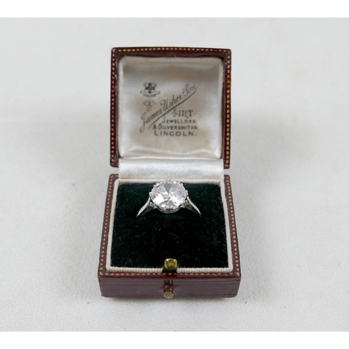 1 - An 18ct white gold and diamond solitaire ring, the round brilliant cut stone approximately 2.8ct, 9.... 