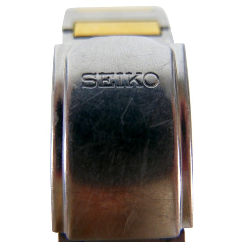 99 - A  Seiko Solar stainless steel and gold plated wristwatch, 36mm case, black dial with batons and Day... 
