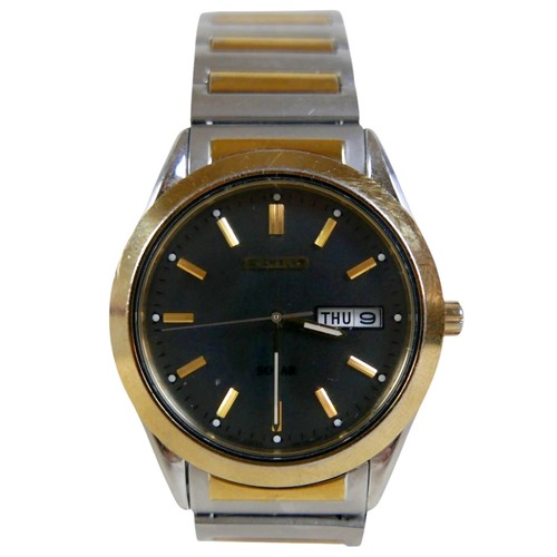 99 - A  Seiko Solar stainless steel and gold plated wristwatch, 36mm case, black dial with batons and Day... 
