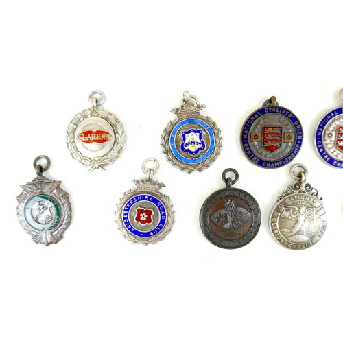 127 - Twelve silver and enamel cycling medallions, of local interest, to include 1948 Hill Climb E. Midlan... 