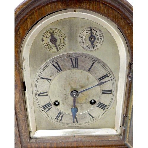 272 - An oak chiming mantle clock with Gustav Becker movement chiming on six rods, 26 by 17 by 32cm high.