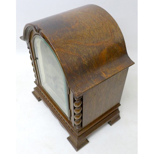 272 - An oak chiming mantle clock with Gustav Becker movement chiming on six rods, 26 by 17 by 32cm high.
