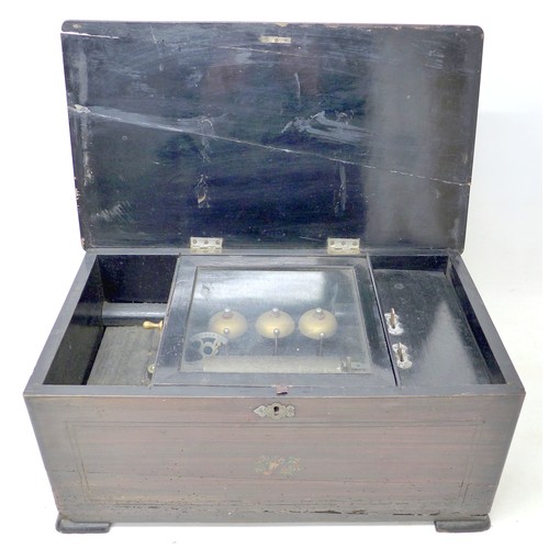 259 - A late Victorian music box with a Swiss barrel movement playing eight airs on three bells, in a simu... 