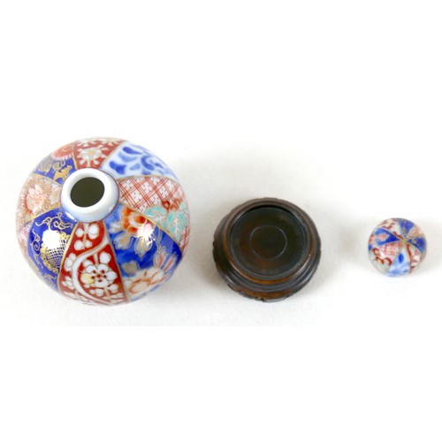 297 - A Chinese soapstone group on stand, a miniature Imari pattern ginger jar, a/f cover damaged, and a y... 