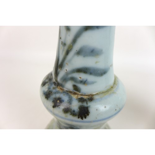 302 - A pair of Chinese Ming style candlesticks, with stepped bases and two tiered columns, each decorated... 