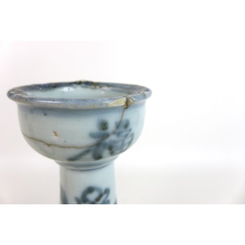 302 - A pair of Chinese Ming style candlesticks, with stepped bases and two tiered columns, each decorated... 