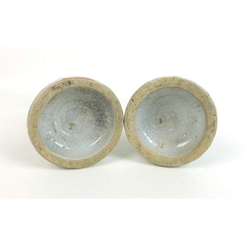 302 - A pair of Chinese Ming style candlesticks, with stepped bases and two tiered columns, each decorated... 
