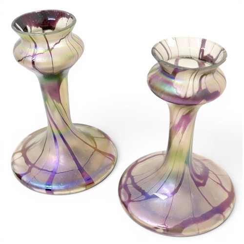304 - A pair of Art Nouveau / Secessionist style glass vases, with iridescent lustre clear grounds and tra... 