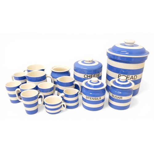 358 - A collection of modern T.G. Green Cloverleaf blue banded Cornish kitchen ware including A wall clock... 