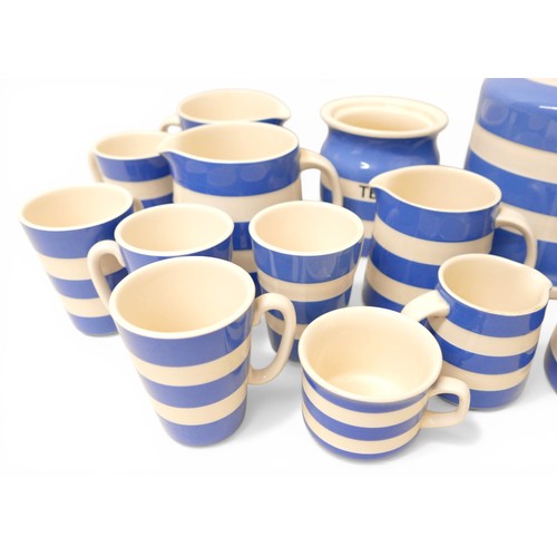 358 - A collection of modern T.G. Green Cloverleaf blue banded Cornish kitchen ware including A wall clock... 