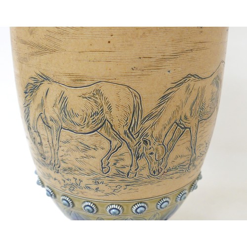 359 - A Doulton Lambeth vase decorated by Hannah Barlow, of baluster form, with blue green foliate rim, th... 