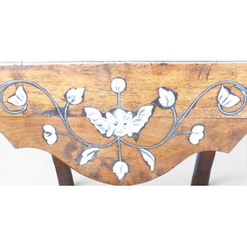 467 - A pair of early 18th century Italian walnut side chairs, with decorative ivory and pewter inlay to t... 