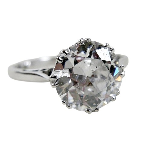 1 - An 18ct white gold and diamond solitaire ring, the round brilliant cut stone approximately 2.8ct, 9.... 
