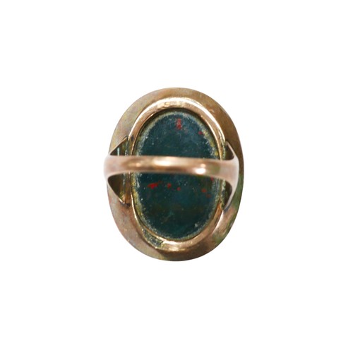35 - A late 19th century bloodstone cameo ring, with a relief carved profile of a Classical male facing r... 