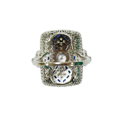 39 - An Art Deco style white metal dress ring, head size 23 by 17mm, size Q.