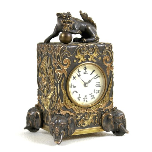 279 - A rare late 19th century gilt bronze and champleve decorated miniature carriage timepiece, by Drocou...