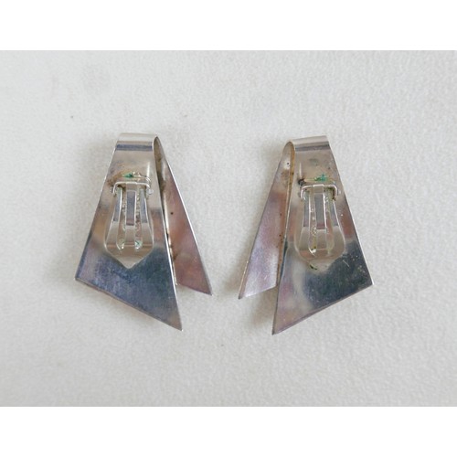 22 - Georg Jensen: A pair of silver earrings, Danish, shaped as folded triangles, 38mm by 25mm, number 20... 