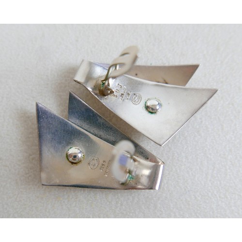 22 - Georg Jensen: A pair of silver earrings, Danish, shaped as folded triangles, 38mm by 25mm, number 20... 