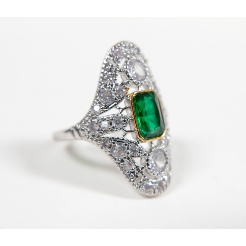 23 - An Art Deco style white metal dress ring size P, head size 18 by 25mm.