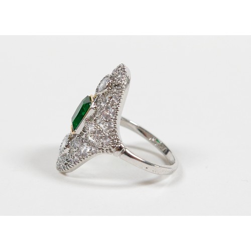 23 - An Art Deco style white metal dress ring size P, head size 18 by 25mm.
