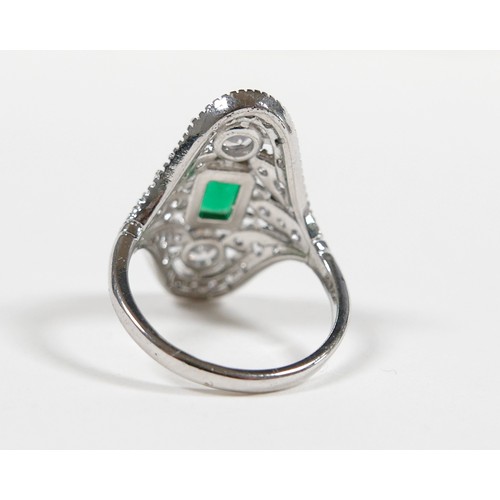 23 - An Art Deco style white metal dress ring size P, head size 18 by 25mm.