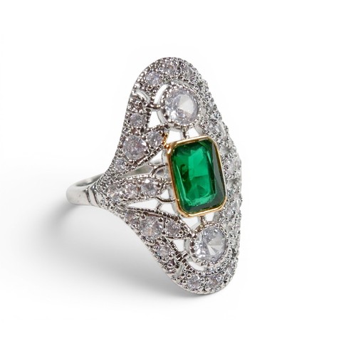 23 - An Art Deco style white metal dress ring size P, head size 18 by 25mm.