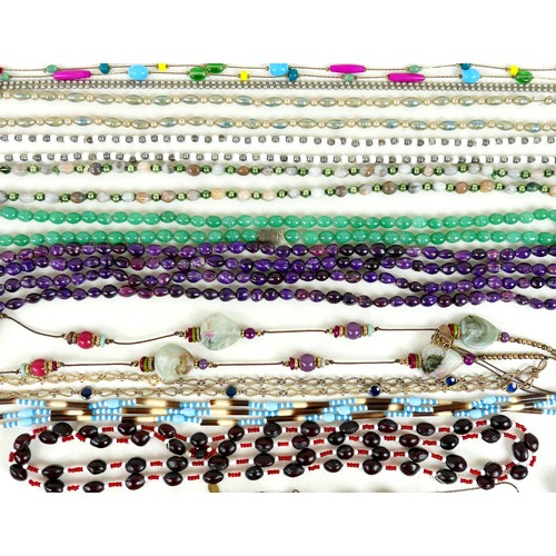 26 - A large collection of costume and other jewellery.(1 bag)