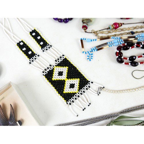 26 - A large collection of costume and other jewellery.(1 bag)